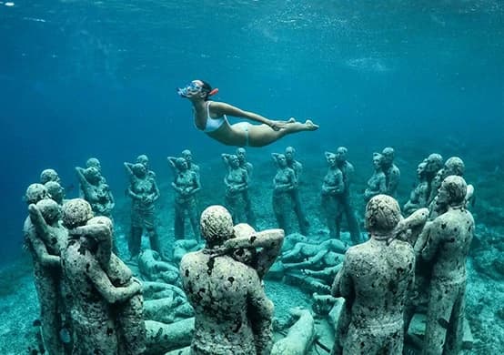 snorkeling-above-statues-3