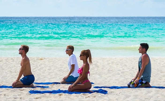 yoga on tropical beach
