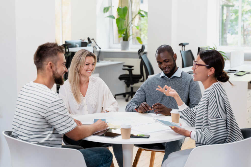 People-meeting-together-conversing-and-gathering-feedback-from-their-stakeholders