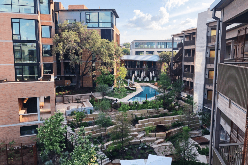 An airborne view of Hotel Magdalena, in Austin Texas; showing their gardens within the centre of the buildings.