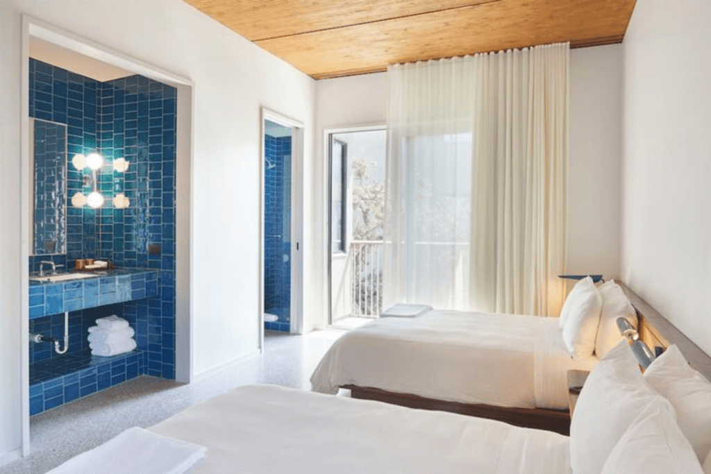 Example room of hotel Magdalena's twin bed suite.