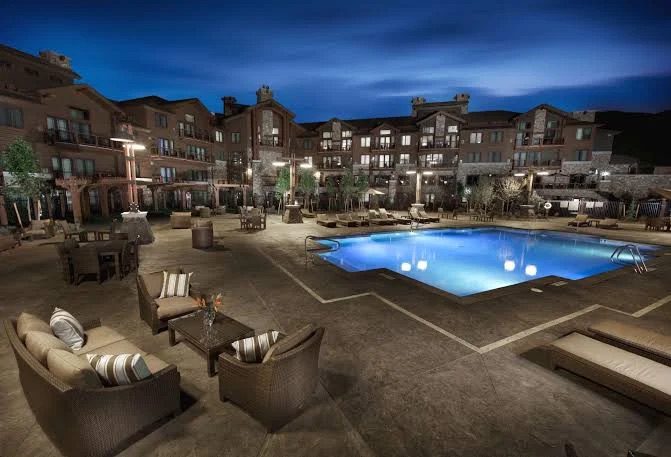 Waldorf Astoria – Park City, Utah - pool overview with resort backdrop